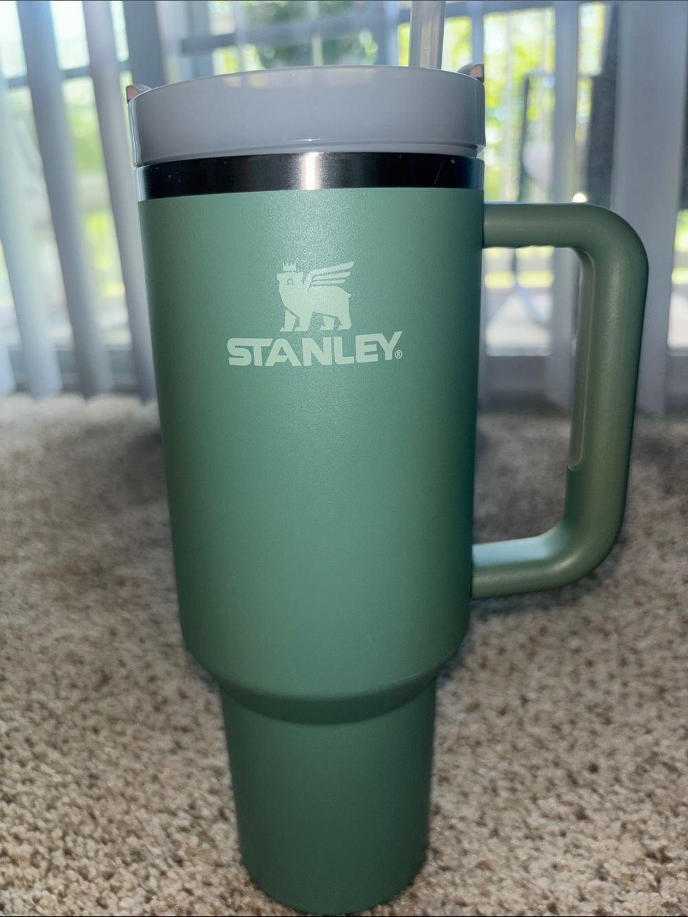 40 ounce Stanley Travel Mug in a eucalyptus green color.